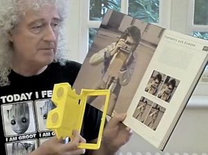 Brian shows open page of German Queen in 3-D